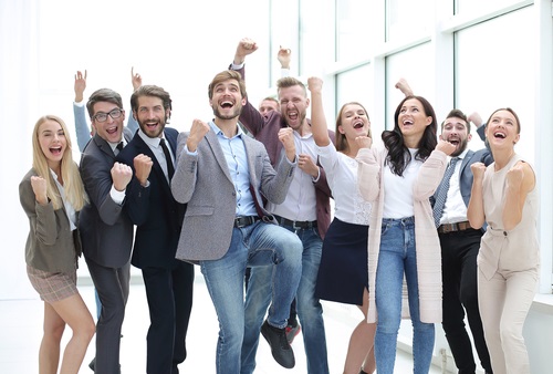In,Full,Growth.,A,Group,Of,Happy,Young,Business,People